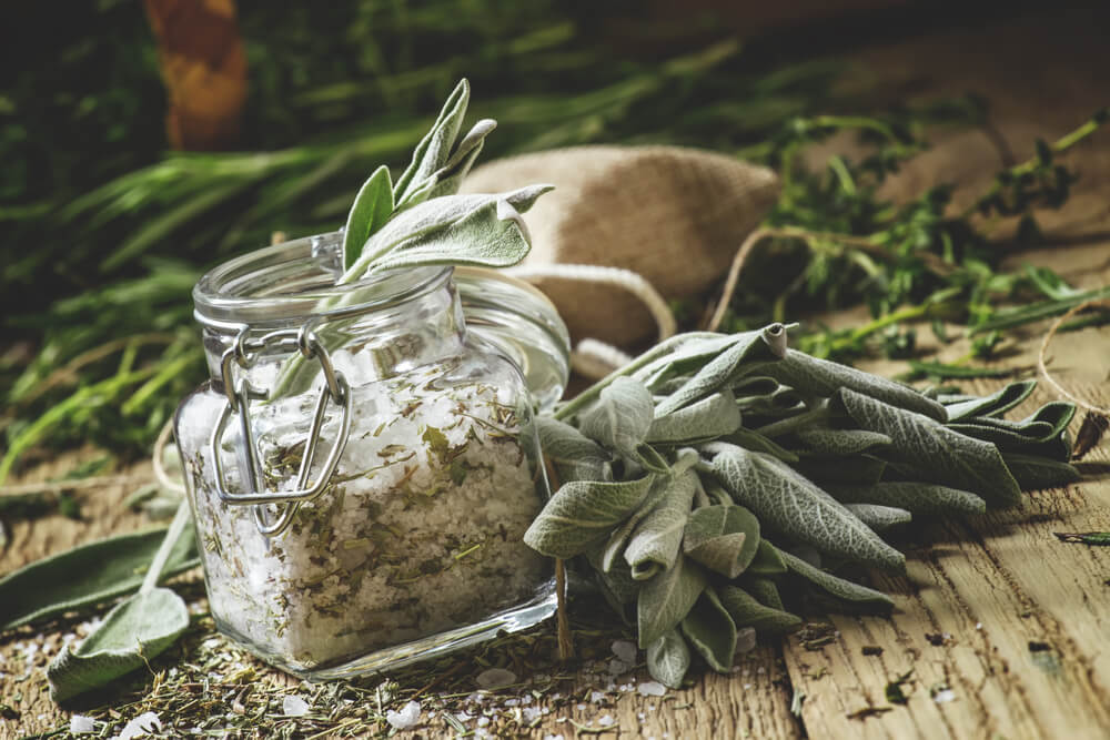 Delicious sea salt mixed with dried garden herbs for preservation and epic home cooking.