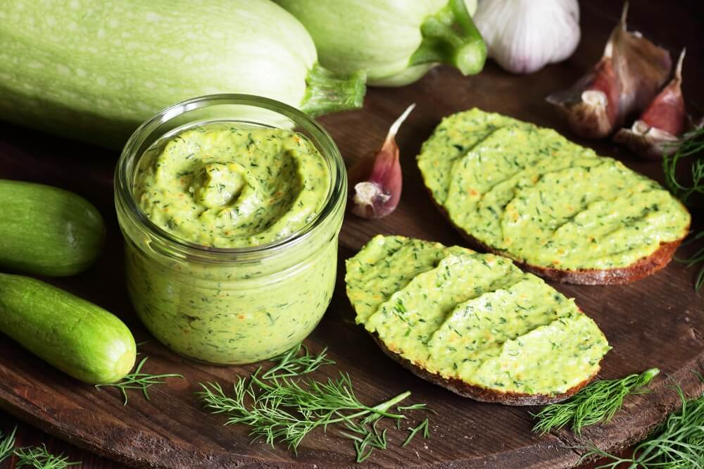 Epic green zucchini herb spread for delicious homemade bread sandwiches and spaghetti dinners.