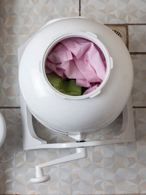Washing clothes off-grid using a non-electric washing machine.